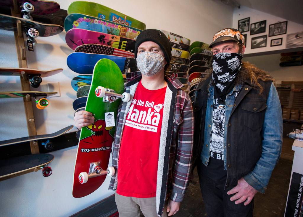 Ben Corey (left) and Ross Jenkins, owners of Pops Skate Shop in Everett. (Olivia Vanni / The Herald)
