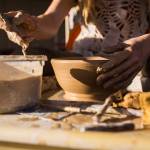 Rachel Recker at work on a bowl at Salish Sea Ceramics in Everett. (Olivia Vanni / The Herald)