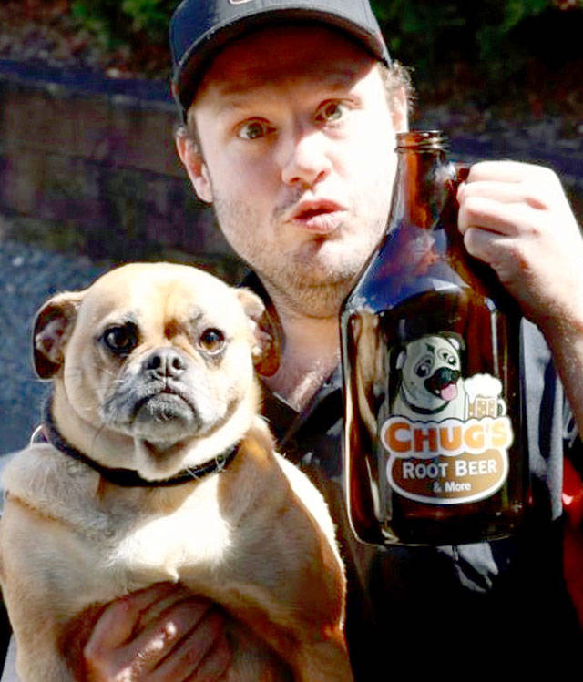 David Castle, owner of Chugs Root Beer & More, with the Lynnwood stores namesake Chug. (Submitted photo)