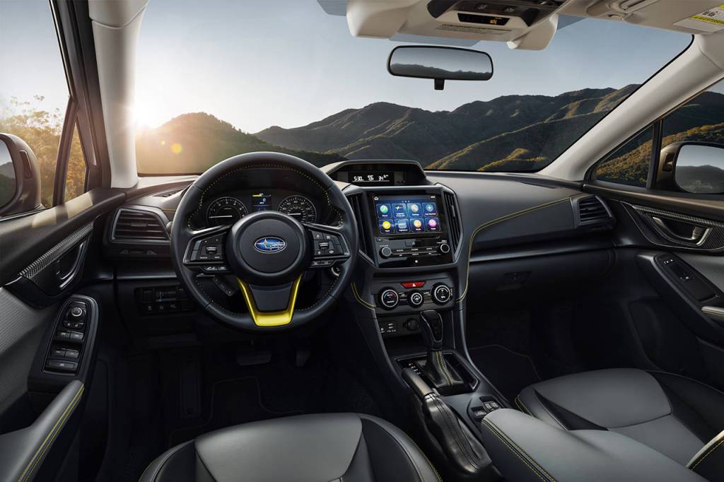 Yellow stitching and accents embellish the 2021 Subaru Crosstrek Sport interior. (Manufacturer photo)