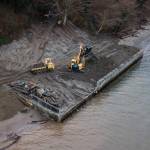 Shoreline restoration north of Langley on Whidbey Island involves removal of an old barge and bulkheads. Such habitat improvements are important to endangered salmon and their prey as sea level rises. This project is a partnership between Seahorse Siesta property owners and the Northwest Straits Foundation. (Olivia Vanni / The Herald)