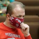 Initiative promoter Tim Eyman listens during a session of Thurston County Superior Court, Wednesday, Feb. 10, 2021, in Olympia, Wash. Eyman, who ran initiative campaigns across Washington for decades, will no longer be allowed to have any financial control over political committees, under a ruling from Superior Court Judge James Dixon Wednesday that blasted Eyman for using donor's contributions to line his own pocket. Eyman was also told to pay more than $2.5 million in penalties. (AP Photo/Ted S. Warren)