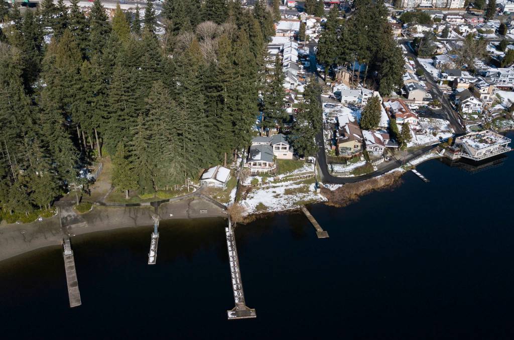 Thornton A. Sullivan Park borders the north Silver Lake neighborhood along West Iberson Drive where parks staff outlined the project to build a path on the north and west sides and connect with the sidewalk already east of the lake. (Olivia Vanni / The Herald)