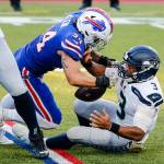 Buffalo Bills' A.J. Klein (54) strip sacks Seattle Seahawks quarterback Russell Wilson (3) during the second half of an NFL football game Sunday, Nov. 8, 2020, in Orchard Park, N.Y. (AP Photo/Jeffrey T. Barnes)