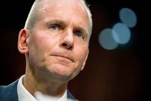 FILE - In this Oct. 29, 2019, file photo Boeing Company President and Chief Executive Officer Dennis Muilenburg appears before a Senate Committee on Commerce, Science, and Transportation hearing on 'Aviation Safety and the Future of Boeing's 737 MAX' on Capitol Hill in Washington. Muilenburg is resigning amid ongoing problems at the company over the troubled Max 737 aircraft. The board of directors said Monday, Dec. 23 that Muilenburg is stepping down immediately. The board's current chairman David Calhoun will become president and CEO on Jan. 13, 2020. (AP Photo/Andrew Harnik, File)
