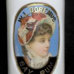 Silly as it may seem, milk glass can be one of many colors. It is an opaque glass first used in the 1800s and now prized in collections of barber bottles of the Victorian era. This 10½-inch-high milk glass barber bottle with a colorful label under glass sold for $200. (Cowles Syndicate Inc.)