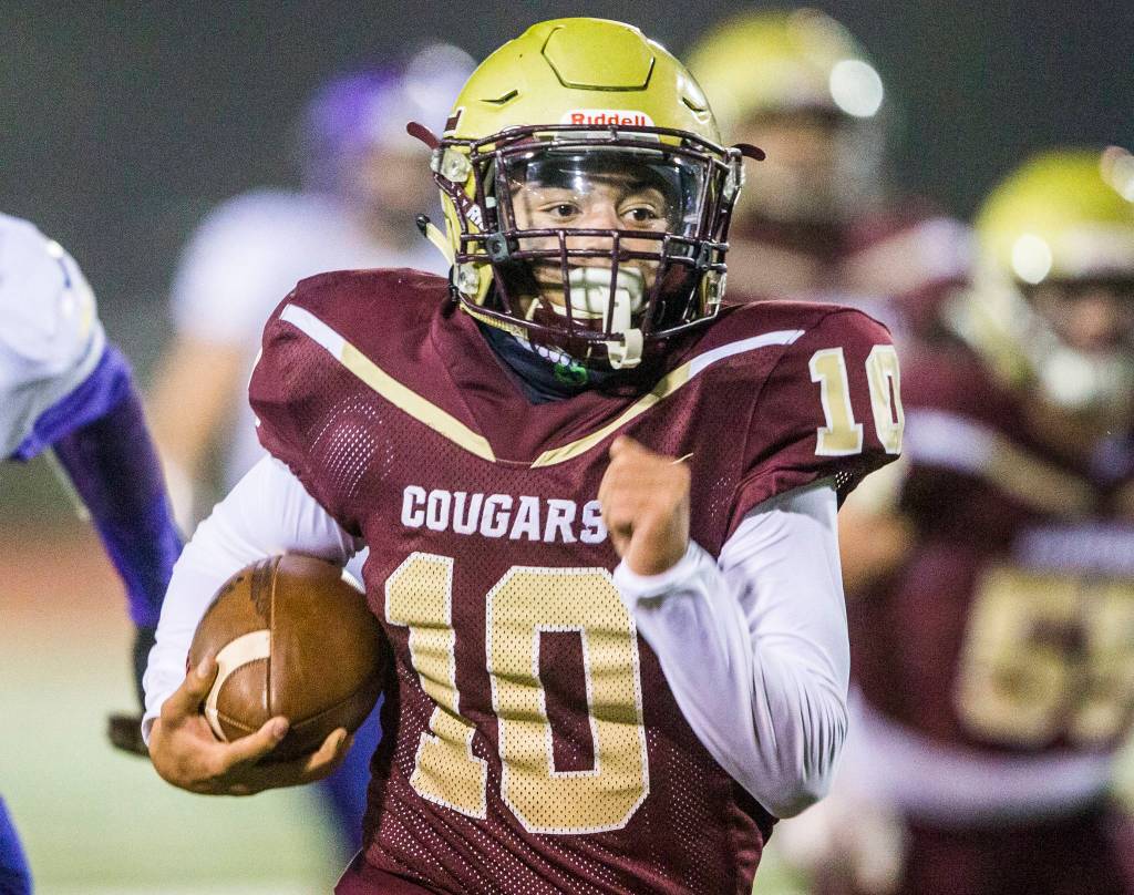 Lakewoods Landen Pruitt runs the ball during a Class 2A State playoff game against Sequim on Nov. 15, 2019 in Arlington. (Olivia Vanni / The Herald)