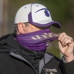 Head Coach Tom Tri pulls on his mask as he yells to his players as he Lake Stevens High School football team conducts its first practice Monday. (Andy Bronson / The Herald)
