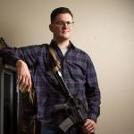 When not at home, Brett Bass keeps his rifle locked in a 600-lb. safe at his home on Tuesday, Oct. 23, 2018 in Edmonds, Wa. Bass, an NRA certified firearms instructor and safety officer, is one of three Edmonds residents who sued to block the city's safe storage gun law from being enforced. (Andy Bronson / The Herald)