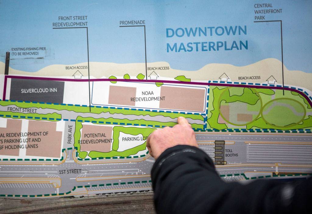 A board, shown here in 2019 displays the now-scrapped plans for the proposed new Northwest Fisheries Science Centers Mukilteo Research Station. (Olivia Vanni / Herald file)