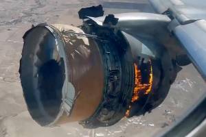 In this image taken from video, the engine of United Airlines Flight 328 is on fire after after experiencing "a right-engine failure" shortly after takeoff from Denver International Airport, Saturday, Feb. 20, 2021, in Denver, Colo. The Boeing 777 landed safely and none of the passengers or crew onboard were hurt. (Chad Schnell via AP)