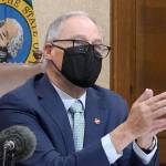 Washington Gov. Jay Inslee speaks at a news conference, Tuesday, Jan. 5, 2021, at the Capitol in Olympia, Wash. Inslee said some COVID-19 restrictions in Washington will be eased beginning next week and the state will change its reopening plan to move from a county-based oversight system to one focused on regions. (AP Photo/Ted S. Warren)