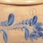 This 1-gallon stoneware crock has the impressed mark of Daniel Shenfelder pottery, proving it was made about 1870 in Pennsylvania. (Cowles Syndicate Inc.)