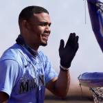 The Mariners Julio Rodriguez waits to bat during a spring training practice on Feb. 25, 2021, in Peoria, Ariz. (AP Photo/Charlie Riedel)
