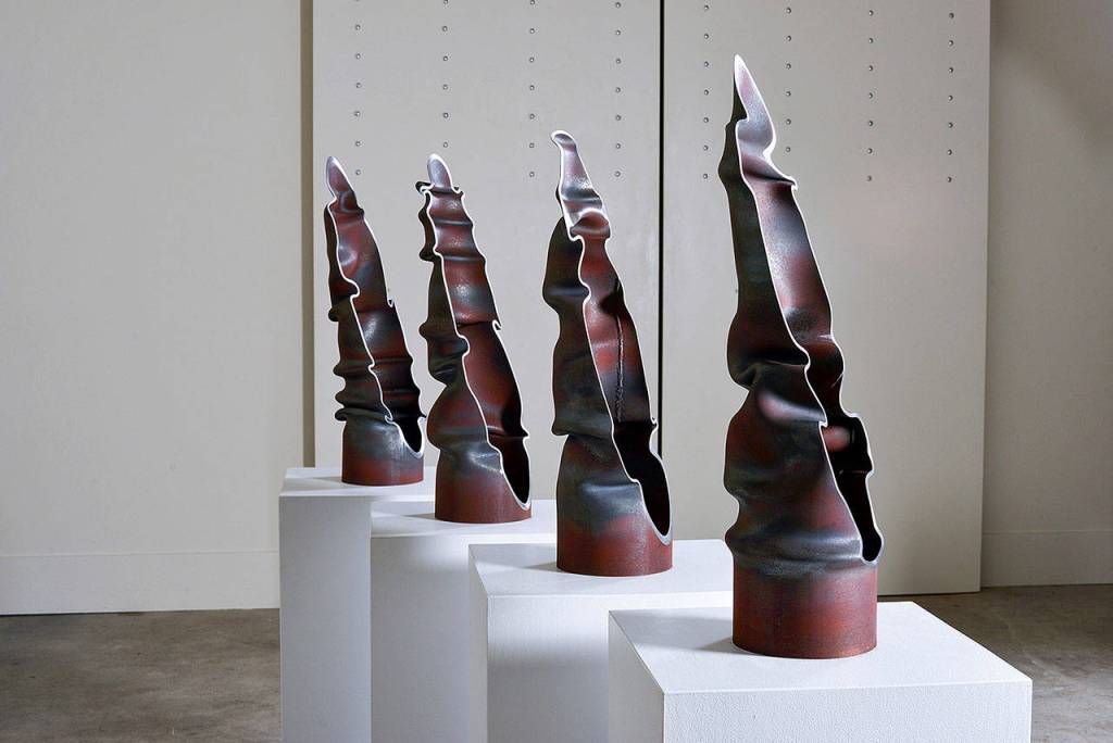 Aaron Loveitt, whose sculpture Stacks is an abstract representation of smokestacks, is one of 15 Northwest sculptors featured at the show.