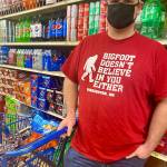 Glad Tidings Assembly of God pastor Tim Ziesemer is a regular shopper at the Darrington IGA, which also sells Bigfoot T-shirts. (Andrea Brown / The Herald)