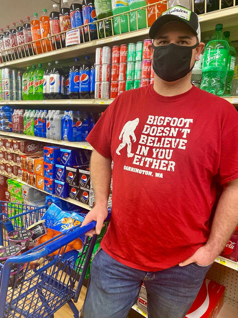 Glad Tidings Assembly of God pastor Tim Ziesemer is a regular shopper at the Darrington IGA, which also sells Bigfoot T-shirts. (Andrea Brown / The Herald)