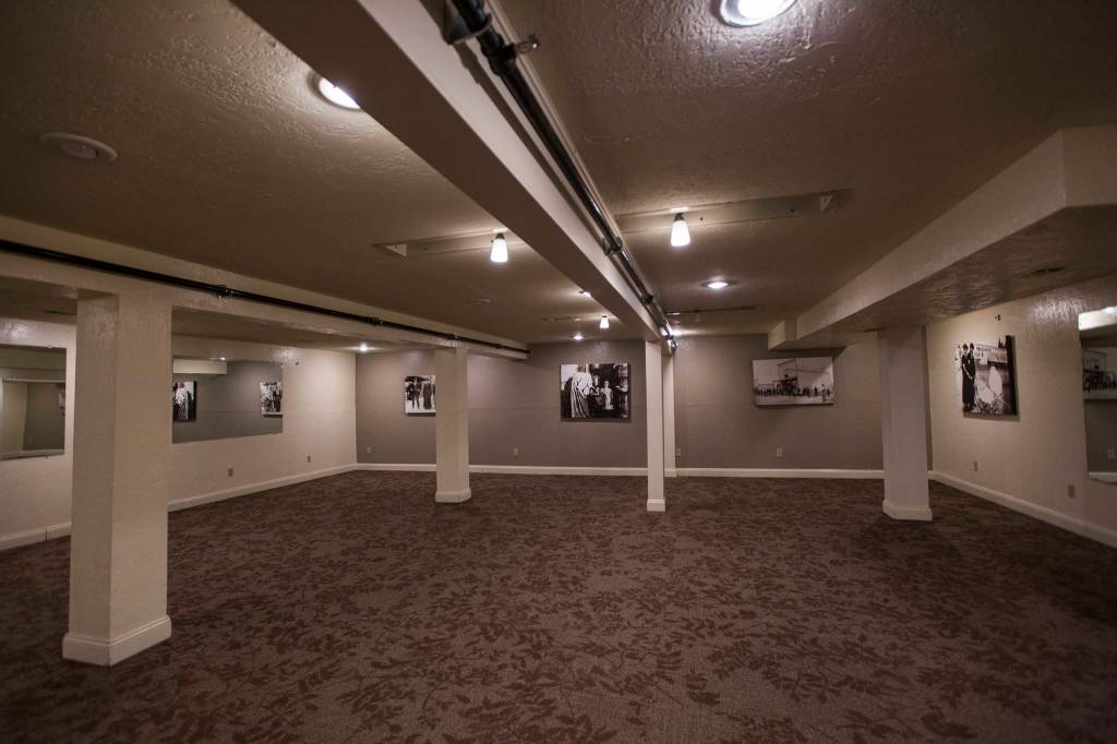The basement of the Marysville Opera House with historical photos of Marysville on display. (Olivia Vanni / The Herald)
