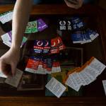 Jonathan Noble lays out the variety of cards with topics and scenarios you must navigate to survive 2020. (Olivia Vanni / The Herald)