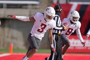 Washington State running back Deon McIntosh (3) celebrates after scoring against Utah during the first half of an NCAA college football game Saturday, Dec. 19, 2020, in Salt Lake City. (AP Photo/Rick Bowmer)