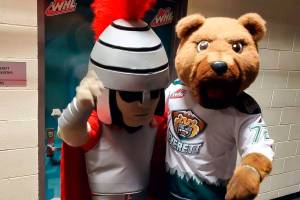 Everett Community College’s Trojan mascot (left) poses with Everett Silvertips mascot, Lincoln. (Provided photo)