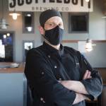 Scuttlebutt Brewing Co. chef Jeremiah Marleau says Everett Restaurant Month was the perfect time to put the massive Triple Threat Burger on Scuttlebutts menu. (Andy Bronson / The Herald)