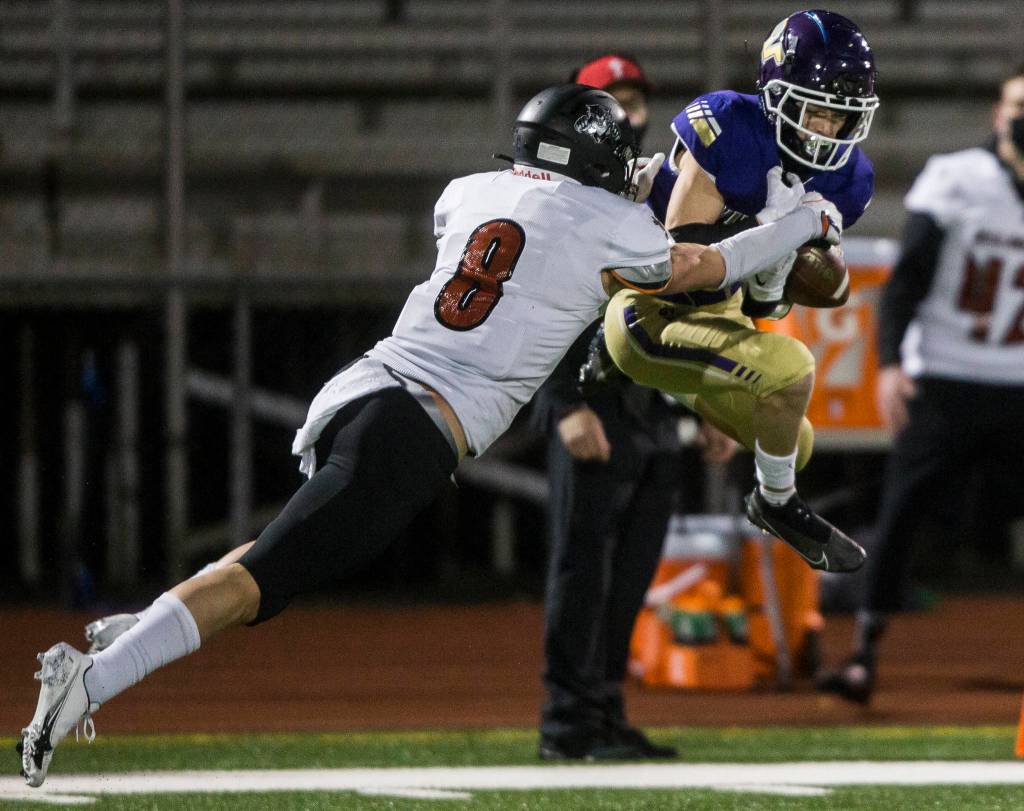 Lake Stevens Gabe Ramsey intercepts a pass to Archbishop Murphys Josh McCarron. It was one of two interceptions for Ramsey. (Olivia Vanni / The Herald)