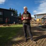 Tom Campbell, who as a legislative staffer helped write the original 1990 Growth Management Act, stands in the eco-friendly subdivision called Clearwater Commons in Bothell. (Andy Bronson / The Herald)