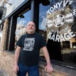 Tony Verhey, owner of Tony Vs Garage, outside of the new bar front on March 23 in Everett. (Olivia Vanni / The Herald)