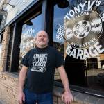 Tony Verhey, owner of Tony V's Garage, outside of the brand new bar front on Tuesday, March 23, 2021 in Everett, Wa. (Olivia Vanni / The Herald)