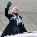 First lady Jill Biden waves after she arrived at Joint Base Lewis-McChord on Monday. On Tuesday, shell go to Naval Air Station Whidbey Island. (AP Photo/Ted S. Warren)