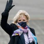 First lady Jill Biden waves after she arrived at Joint Base Lewis-McChord, Monday, March 8, 2021, in Washington state. Biden is scheduled to tour a portion of the base and visit with military families on Tuesday. (AP Photo/Ted S. Warren)
