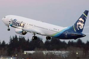FILE - The first Alaska Airlines passenger flight on a Boeing 737-9 Max airplane takes off, Monday, March 1, 2021, on a flight to San Diego from Seattle-Tacoma International Airport in Seattle.   Boeing says it got more new orders than cancellations for planes in February.  Boeing said Tuesday, March 9, that it received 82 new orders and 51 cancellations last month, for a net gain of 31.    (AP Photo/Ted S. Warren, File)
