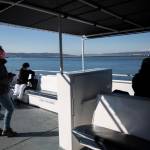 People keep their distance aboard the Island Explorer 4. (Olivia Vanni / The Herald)