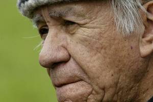 ** ADVANCE FOR WEEKEND OCT. 8-9 ** Billy Frank pauses to remember distant times as he walks along the Nisqually River near Olympia, Wash. Thursday, April 14, 2005 where he was born and lived as a child. The Nisqually Indian elder and activist contributed leadership and multiple arrests to the battle fought by Northwest Indian tribes for their treaty-negotiated salmon-fishing rights. (AP Photo/Ted S. Warren)