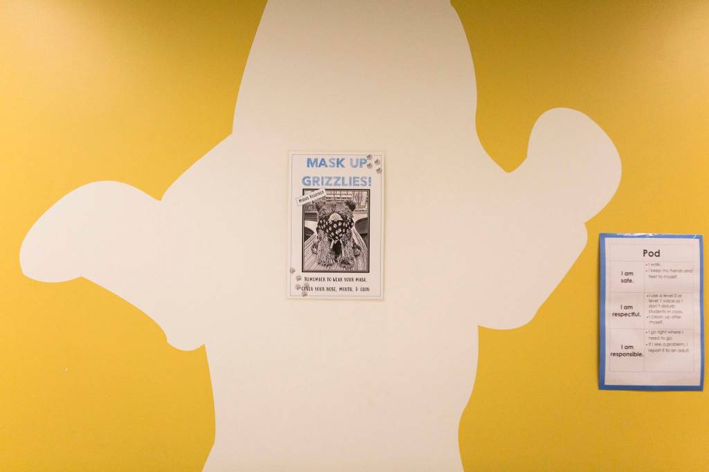 Posters reminding students to wear masks and how to navigate their pods at Lake Stickney Elementary in Lynnwood. (Olivia Vanni / The Herald)