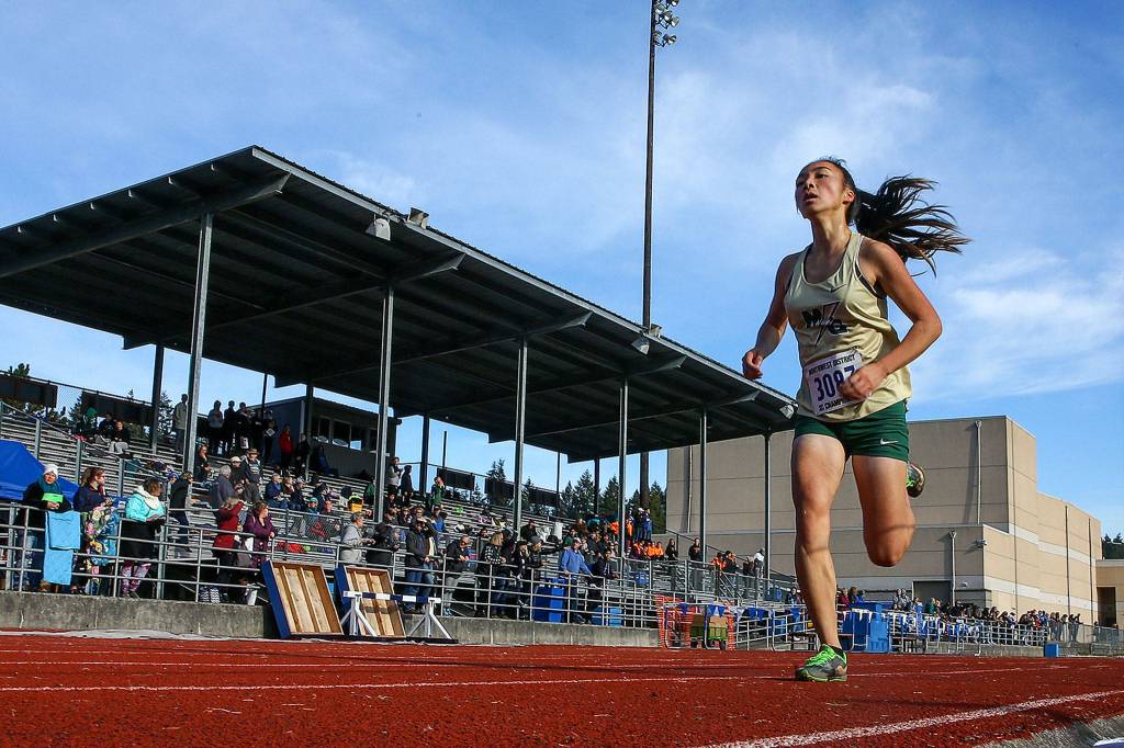 Marysville Getchells Jasmine Nguyen finishes first in the 3A division at the District 1 Cross Country Championship on Nov. 2, 2019, at South Whidbey High School in Langley. (Kevin Clark / The Herald)