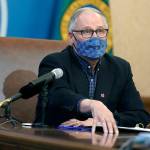Washington Gov. Jay Inslee speaks during a news conference Thursday, March 11, 2021, at the Capitol in Olympia, Wash. Inslee said that the Seattle Mariners baseball team, the Seattle Sounders MLS soccer team and the National Women's Soccer League's OL Reign will soon be able to welcome a limited number of fans to their stadiums under a 25% seating capacity when they open their seasons. The easing of restrictions will also apply to high school sports, and was one of several aspects of the state's ongoing re-opening plan developed during the COVID-19 pandemic that were announced Thursday. (AP Photo/Ted S. Warren)