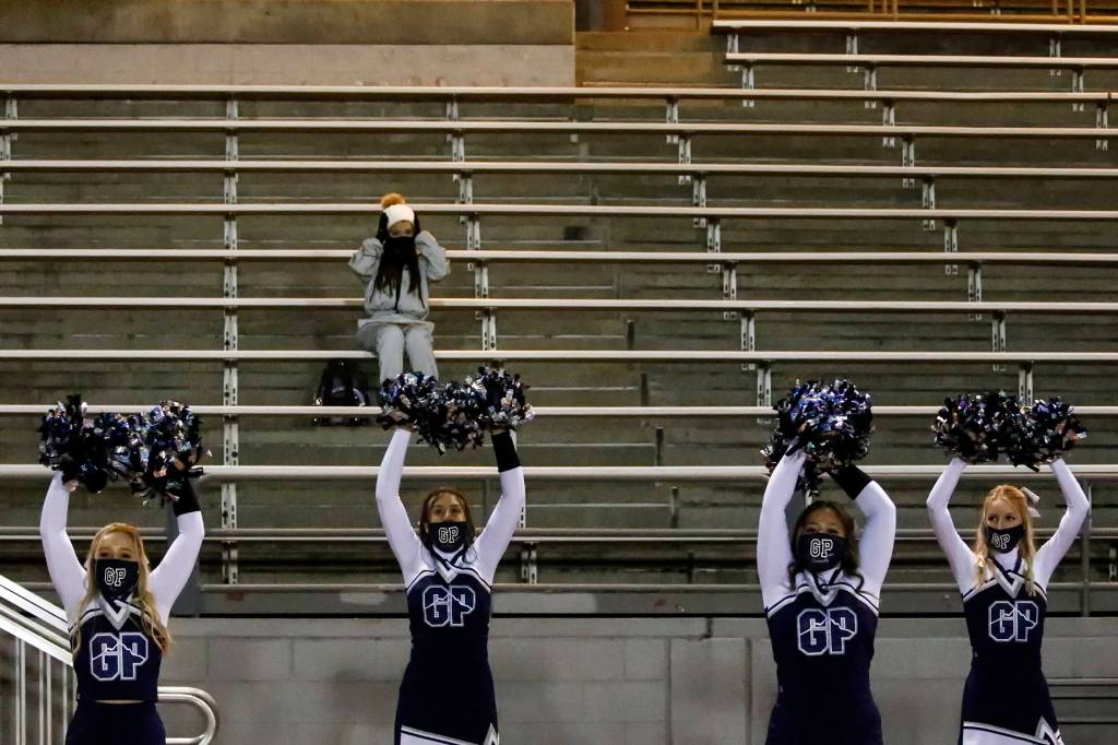 Empty seats stand vigil for the cross town rivalry between Snohomish and Glacier Peak at Veterans Memorial Stadium Friday night in Snohomish on March 12, 2021. (Kevin Clark / The Herald)