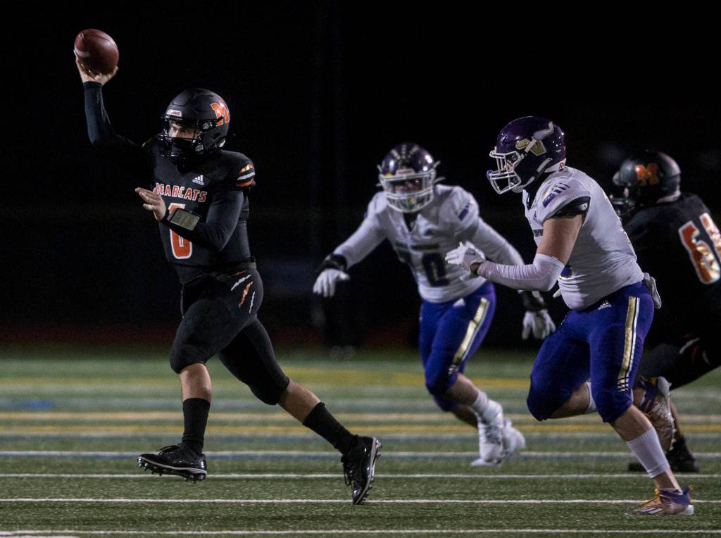 Monroes Brycen Blankenship throws a pass during the game against Lake Stevens on Friday, March 12, 2021 in Monroe, Wa. (Olivia Vanni / The Herald)