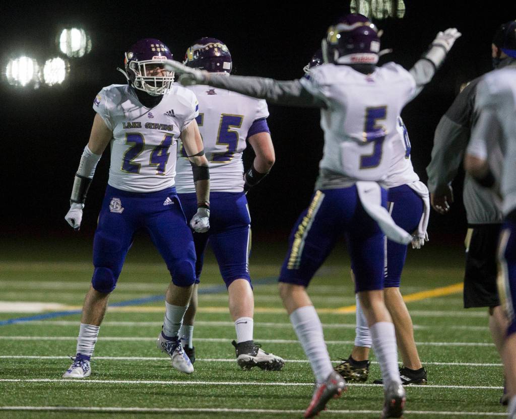 Lake Stevens Tyler Lutz celebrates after stopping pass during the game against Monroe on Friday, March 12, 2021 in Monroe, Wa. (Olivia Vanni / The Herald)