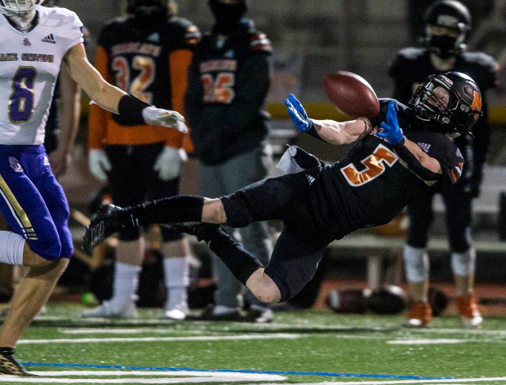 Monroes Todd Chatterton jumps for a pass during the game against Lake Stevens on Friday, March 12, 2021 in Monroe, Wa. (Olivia Vanni / The Herald)
