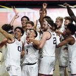 Gonzaga players celebrate after defeating BYU in an NCAA college basketball game for the West Coast Conference men's tournament championship Tuesday, March 9, 2021, in Las Vegas. (AP Photo/David Becker)