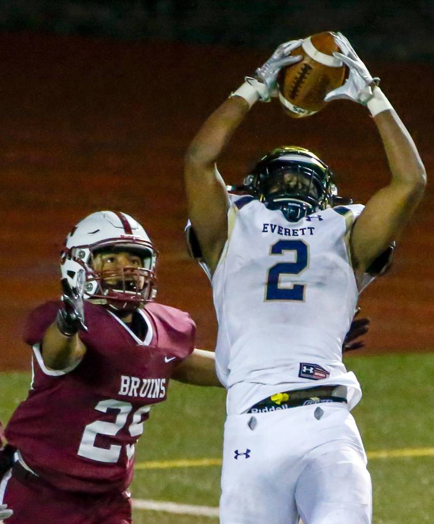 The annual Battle of Broadway between Everett High and Cascade High at Everett Memorial Stadium Friday night on March 19, 2021. (Kevin Clark / The Herald)
