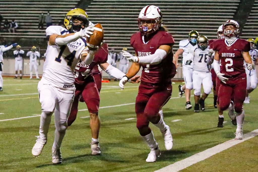 The annual Battle of Broadway between Everett High and Cascade High at Everett Memorial Stadium Friday night on March 19, 2021. (Kevin Clark / The Herald)