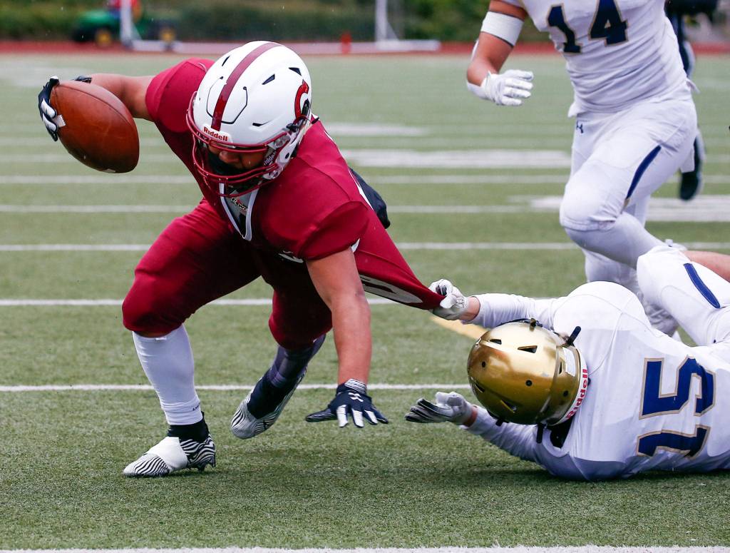 The annual Battle of Broadway between Everett High and Cascade High at Everett Memorial Stadium Friday night on March 19, 2021. (Kevin Clark / The Herald)