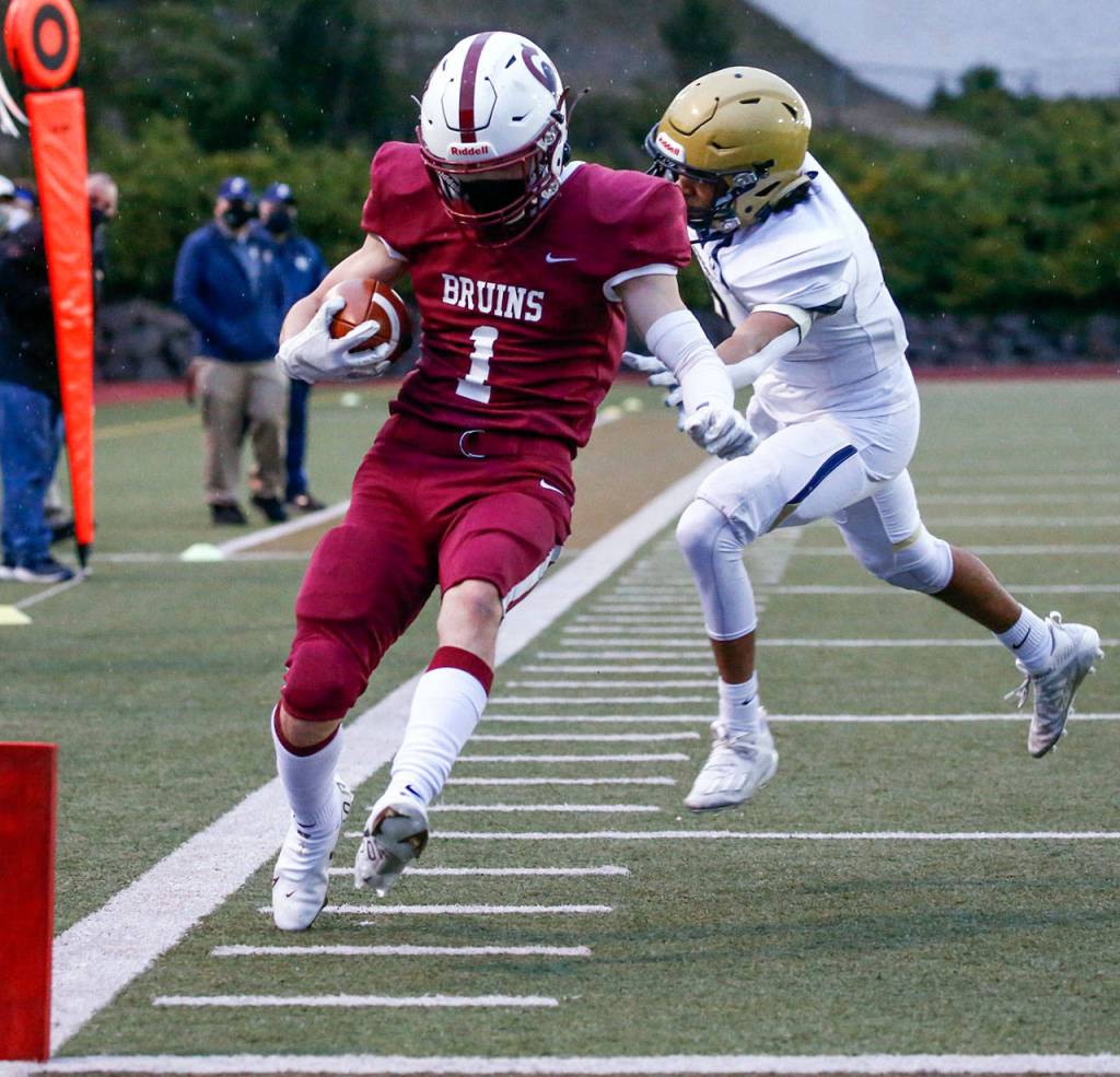 The annual Battle of Broadway between Everett High and Cascade High at Everett Memorial Stadium Friday night on March 19, 2021. (Kevin Clark / The Herald)