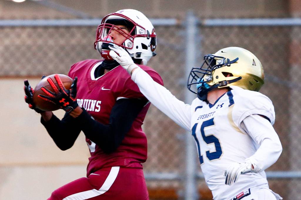 The annual Battle of Broadway between Everett High and Cascade High at Everett Memorial Stadium Friday night on March 19, 2021. (Kevin Clark / The Herald)