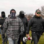 In this Jan. 6 photo, Proud Boys including Joseph Biggs (left) and Ethan Nordean (with megaphone) walk toward the U.S. Capitol in Washington, in support of President Donald Trump. (AP Photo/Carolyn Kaster, file)