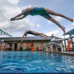 Shorecrests Mia Sanchez (top) and Elle Howson take off from the blocks as the girls swim team practices at a four-lane outdoor pool at Sheridan Beach Community Club on Tuesday in Lake Forest Park. The Shoreline Pool closed down when COVID hit and left the Shoreline School District without an indoor facility to practice at. (Andy Bronson / The Herald)